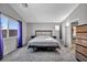 Main bedroom with plush carpet and a large window providing ample natural light at 1104 Christopher View Ave, North Las Vegas, NV 89032