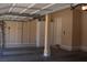Spacious two car garage featuring ample space for vehicle storage and organization at 11268 Corsica Mist Ave, Las Vegas, NV 89135