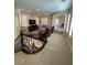 Upstairs loft with a wrought iron railing, neutral paint, and plantation shutters at 11268 Corsica Mist Ave, Las Vegas, NV 89135