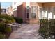 Private patio features outdoor seating, lush landscaping, and a tranquil ambiance at 11268 Corsica Mist Ave, Las Vegas, NV 89135