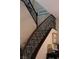 Elegant staircase with decorative iron railings and wood trim at 11268 Corsica Mist Ave, Las Vegas, NV 89135