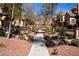 Landscaped street view featuring sidewalks and well-maintained yards at 11268 Corsica Mist Ave, Las Vegas, NV 89135