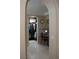 Spacious walk-in closet with custom shelving and a vanity area for dressing at 11268 Corsica Mist Ave, Las Vegas, NV 89135