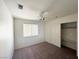 Bedroom with carpet, ceiling fan, window with blinds, and closet with sliding doors at 1301 Misty View Ct, North Las Vegas, NV 89031