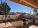 Outdoor kitchen featuring a built-in barbecue grill, sink, prep areas, and block wall for privacy at 1301 Misty View Ct, North Las Vegas, NV 89031