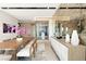 Contemporary dining room with modern decor, large table, and stylish accents at 1572 Pleasant Bay Ct, Henderson, NV 89011