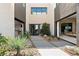 Inviting entryway with modern design, lush landscaping, and open access to the home at 1572 Pleasant Bay Ct, Henderson, NV 89011