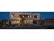 Stunning modern home exterior with unique architectural features and manicured landscaping at 1572 Pleasant Bay Ct, Henderson, NV 89011