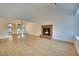 Bright living room with hardwood floors and a cozy brick fireplace at 163 Spinnaker Dr, Henderson, NV 89015