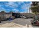 Backyard featuring a basketball hoop, large tree, and concrete pavers at 1808 Walnut Ave, Las Vegas, NV 89101