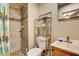 Bathroom featuring a standing shower, toilet, and sink with mirror at 1808 Walnut Ave, Las Vegas, NV 89101