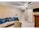 View of a bedroom with a ceiling fan and tile floors at 1808 Walnut Ave, Las Vegas, NV 89101