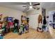 Bedroom featuring wood-look tile floors, with a ceiling fan for added comfort at 1808 Walnut Ave, Las Vegas, NV 89101