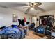 Spacious bedroom featuring a ceiling fan, closet, and basic furnishings at 1808 Walnut Ave, Las Vegas, NV 89101