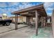 Attached covered carport, patio area, and spacious driveway for off-street parking at 1808 Walnut Ave, Las Vegas, NV 89101