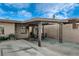 Attached covered carport and patio area with spacious driveway for off-street parking at 1808 Walnut Ave, Las Vegas, NV 89101