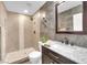 Bathroom with modern fixtures including a tiled shower and marble countertop at 1912 Sierra Oaks Ln, Las Vegas, NV 89134