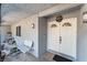 Inviting front entryway featuring double doors, neutral paint, and a cozy welcome mat at 1920 Parkchester Dr, Las Vegas, NV 89108