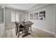 Bright dining room features modern lighting and a large window at 2602 Evening Sky Dr, Henderson, NV 89052