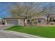 Charming single-story home featuring a well-manicured lawn, desert landscaping, and a two-car garage at 2602 Evening Sky Dr, Henderson, NV 89052