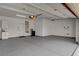 Spacious two car garage with painted floor and storage cabinet at 2602 Evening Sky Dr, Henderson, NV 89052