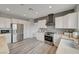 Spacious kitchen boasts stainless appliances, white cabinets, and wooden countertops at 2602 Evening Sky Dr, Henderson, NV 89052