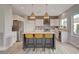 Well-appointed kitchen featuring an island with seating, stainless steel appliances, and contemporary design at 2602 Evening Sky Dr, Henderson, NV 89052