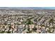 Expansive community view showcases the neighborhood's layout, proximity to city amenities and desert landscape at 3047 Whispering Crest Dr, Henderson, NV 89052