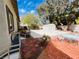 This backyard features a basketball court, shed, patio and drought tolerant landscaping at 3047 Whispering Crest Dr, Henderson, NV 89052