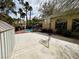 This backyard offers a pool, basketball court, patio and ample yard space at 3047 Whispering Crest Dr, Henderson, NV 89052