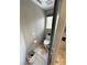 Bathroom contains toilet in separate room with a modern stone-floor shower behind a glass door at 3047 Whispering Crest Dr, Henderson, NV 89052