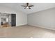 Large bedroom with wood-look floors, a ceiling fan, and open access to other rooms at 3047 Whispering Crest Dr, Henderson, NV 89052