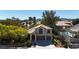 Charming two-story home with a well-manicured lawn, three-car garage and mature trees in a desirable neighborhood at 3047 Whispering Crest Dr, Henderson, NV 89052