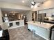 Open-concept kitchen with island overlooking living area at 3047 Whispering Crest Dr, Henderson, NV 89052