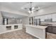 Open kitchen with an island, stainless appliances, and ample counter space at 3047 Whispering Crest Dr, Henderson, NV 89052