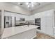 Bright kitchen featuring white cabinets, stainless steel appliances, and plenty of storage at 3047 Whispering Crest Dr, Henderson, NV 89052