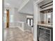 Well-lit living room with tile floors and stylish architectural details at 3047 Whispering Crest Dr, Henderson, NV 89052