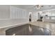 Open living area showcases the tiled floors and plantation shutters with seamless transition to other living spaces at 3047 Whispering Crest Dr, Henderson, NV 89052