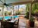 Covered patio with a view of the swimming pool and beautifully landscaped backyard at 3047 Whispering Crest Dr, Henderson, NV 89052