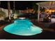 This backyard offers a relaxing pool and outdoor seating area perfect for entertaining friends and Gathering at 3047 Whispering Crest Dr, Henderson, NV 89052