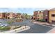 Community featuring well-manicured landscaping and a circular driveway at 3975 N Hualapai Way # 285, Las Vegas, NV 89129