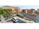 An aerial view of a well-maintained property with lush landscaping and mature trees at 3975 N Hualapai Way # 285, Las Vegas, NV 89129