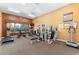 Well-equipped exercise room with modern machines, ample natural light, and exercise guidelines posted on the wall at 3975 N Hualapai Way # 285, Las Vegas, NV 89129