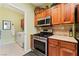 Gourmet kitchen with stainless steel appliances and ample countertop space, perfect for culinary enthusiasts and entertaining at 3975 N Hualapai Way # 285, Las Vegas, NV 89129