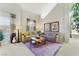 Bright living room featuring high ceilings, large windows, neutral tones, and stylish furnishings, offering comfortable living at 3975 N Hualapai Way # 285, Las Vegas, NV 89129