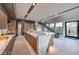 Gourmet kitchen featuring a marble island, modern appliances, and seamless design, perfect for entertaining and culinary creations at 4077 Heron Fairway Dr, Las Vegas, NV 89141
