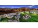 Rooftop deck with putting green, comfortable lounge chairs, and city views creating an inviting outdoor space at 4077 Heron Fairway Dr, Las Vegas, NV 89141