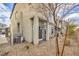 View of the home's backyard featuring low maintenance gravel and xeriscaping with desert plants at 4234 Lunar Canyon Ave, North Las Vegas, NV 89084