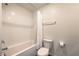 Bathroom with white subway tile and a white shower curtain at 4234 Lunar Canyon Ave, North Las Vegas, NV 89084