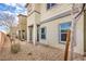 Home exterior showcasing modern architecture, stucco walls, and desert landscaping at 4234 Lunar Canyon Ave, North Las Vegas, NV 89084